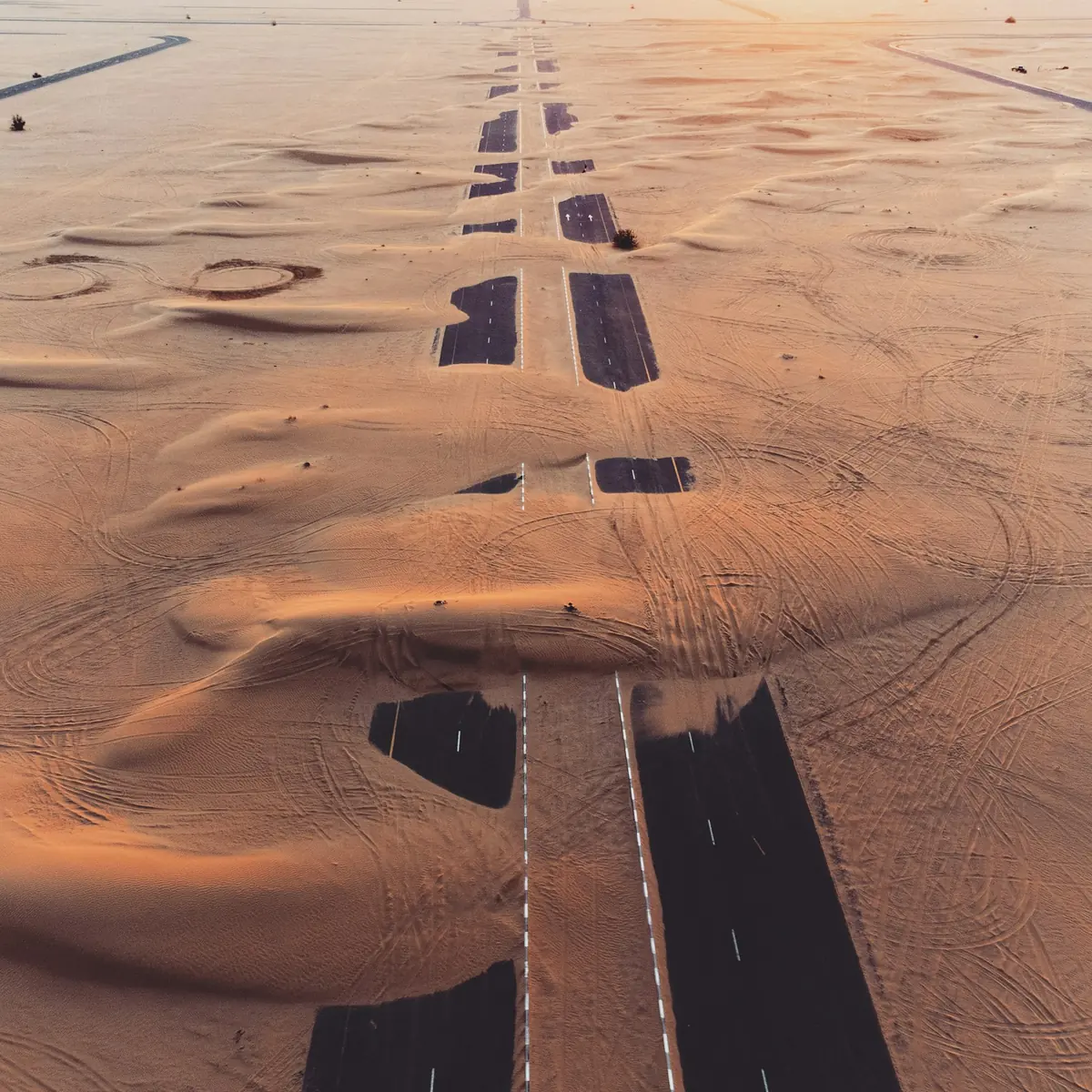 Desert road crossing the dunes