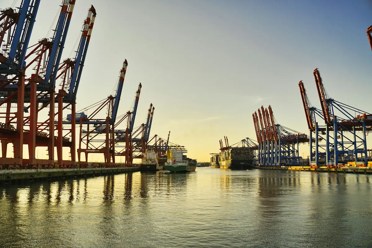 Port cranes at golden hour