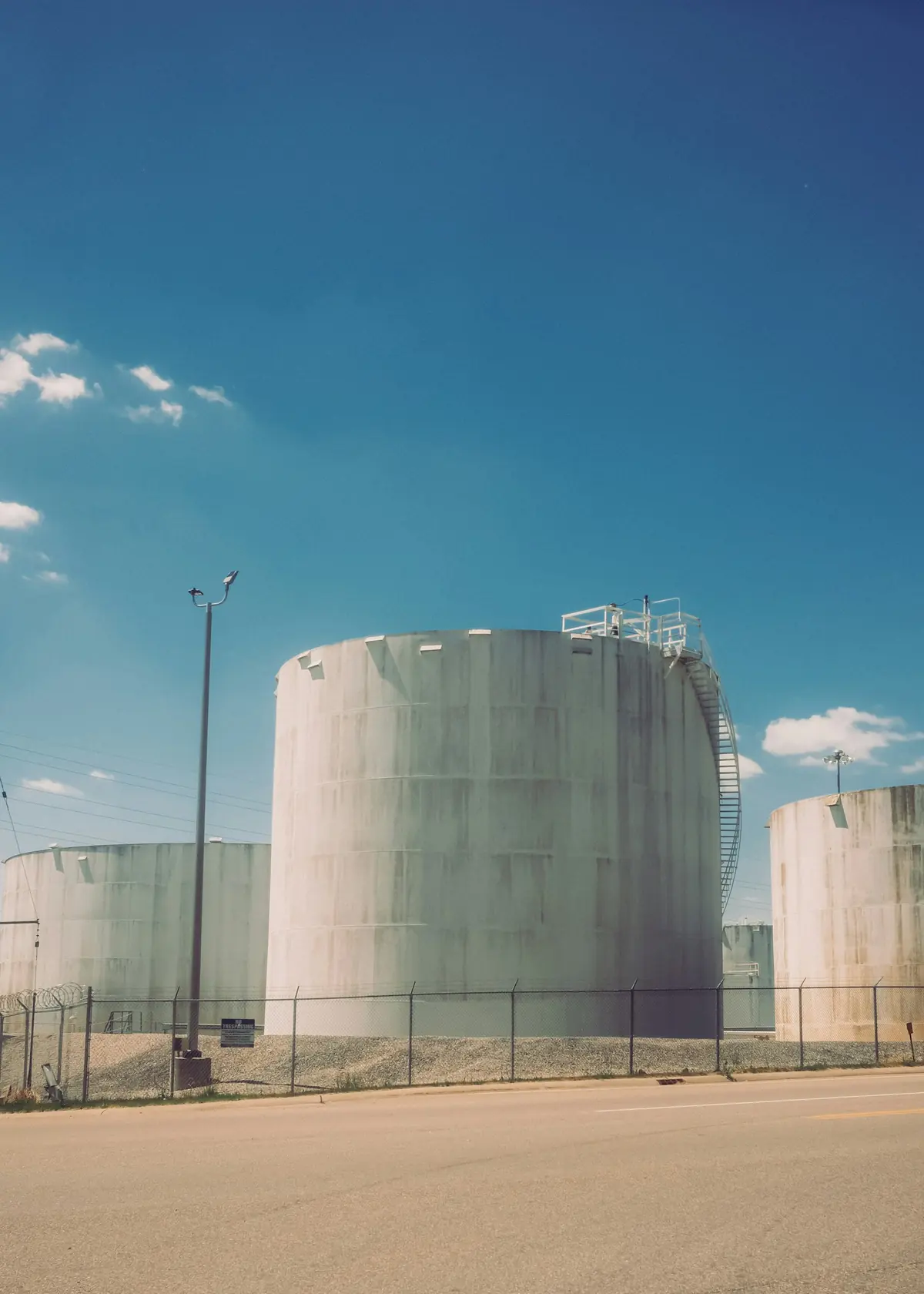 Storage tank under a clear sky